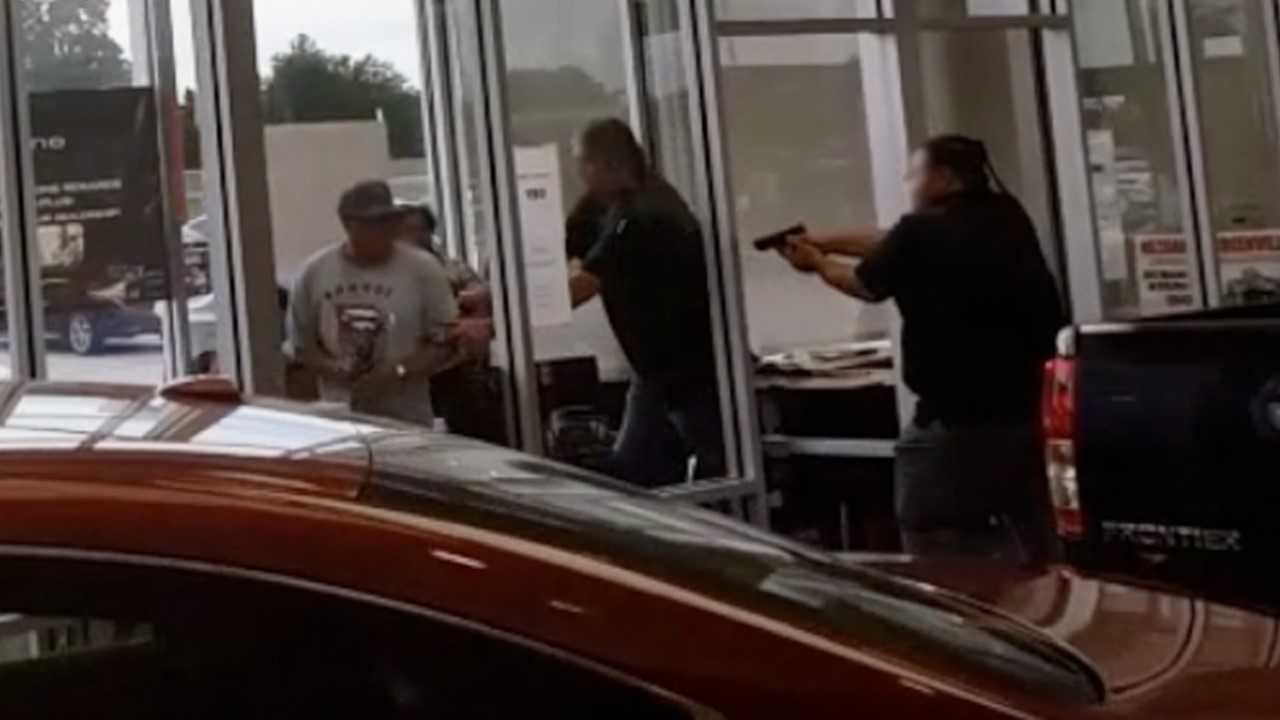 Texas bounty hunters shot dead in car dealership were offered 3K